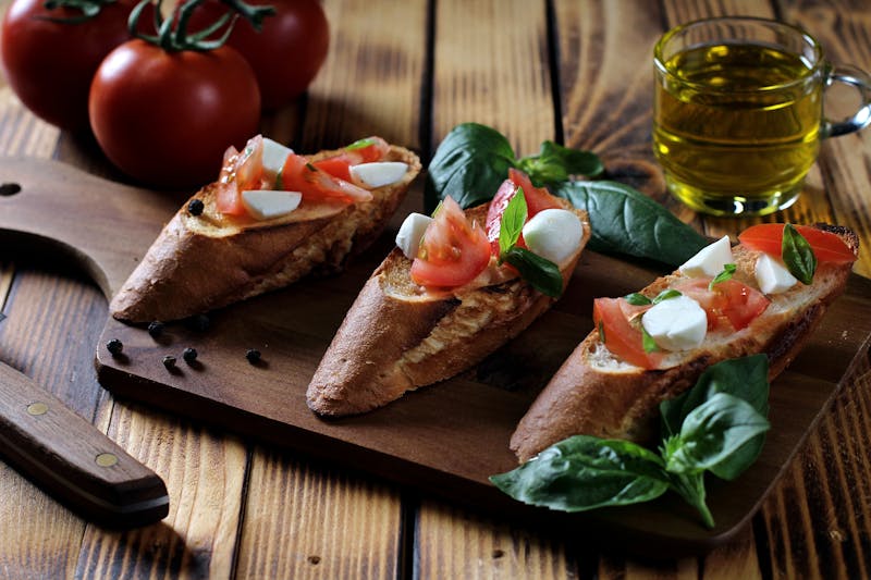 Fresh bruschetta with tomato and basil on toasted bread
